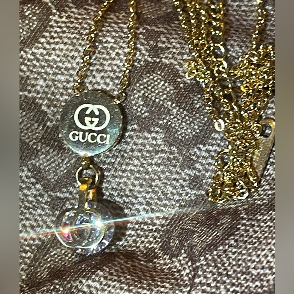 GGee floating crystal necklace monogram to match your bag gorgeous 😍😍💎